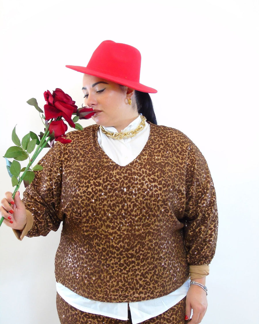 Sequin and animal print knit top