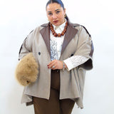 poncho con dettagli in pelle 86599