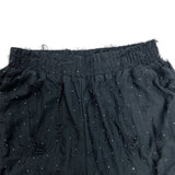 Pantalone con brillantini e strappo 3304