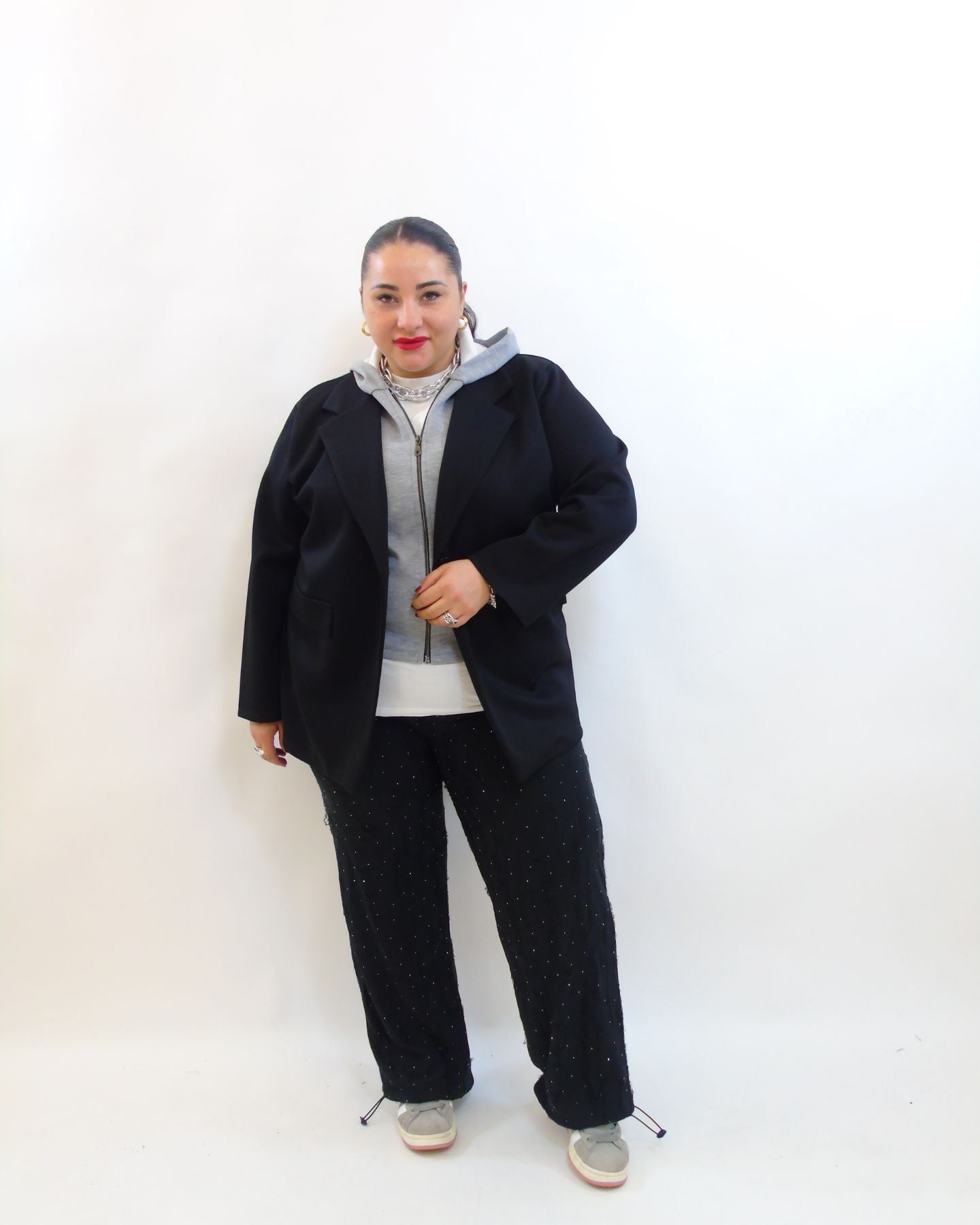 Pantalone con brillantini e strappo 3304