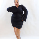 Abito con drappeggio