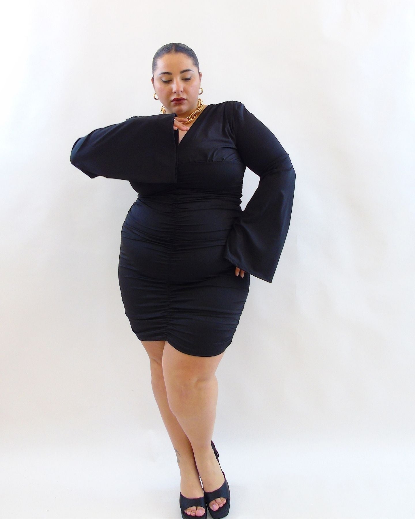 Abito con drappeggio