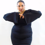 Abito con drappeggio