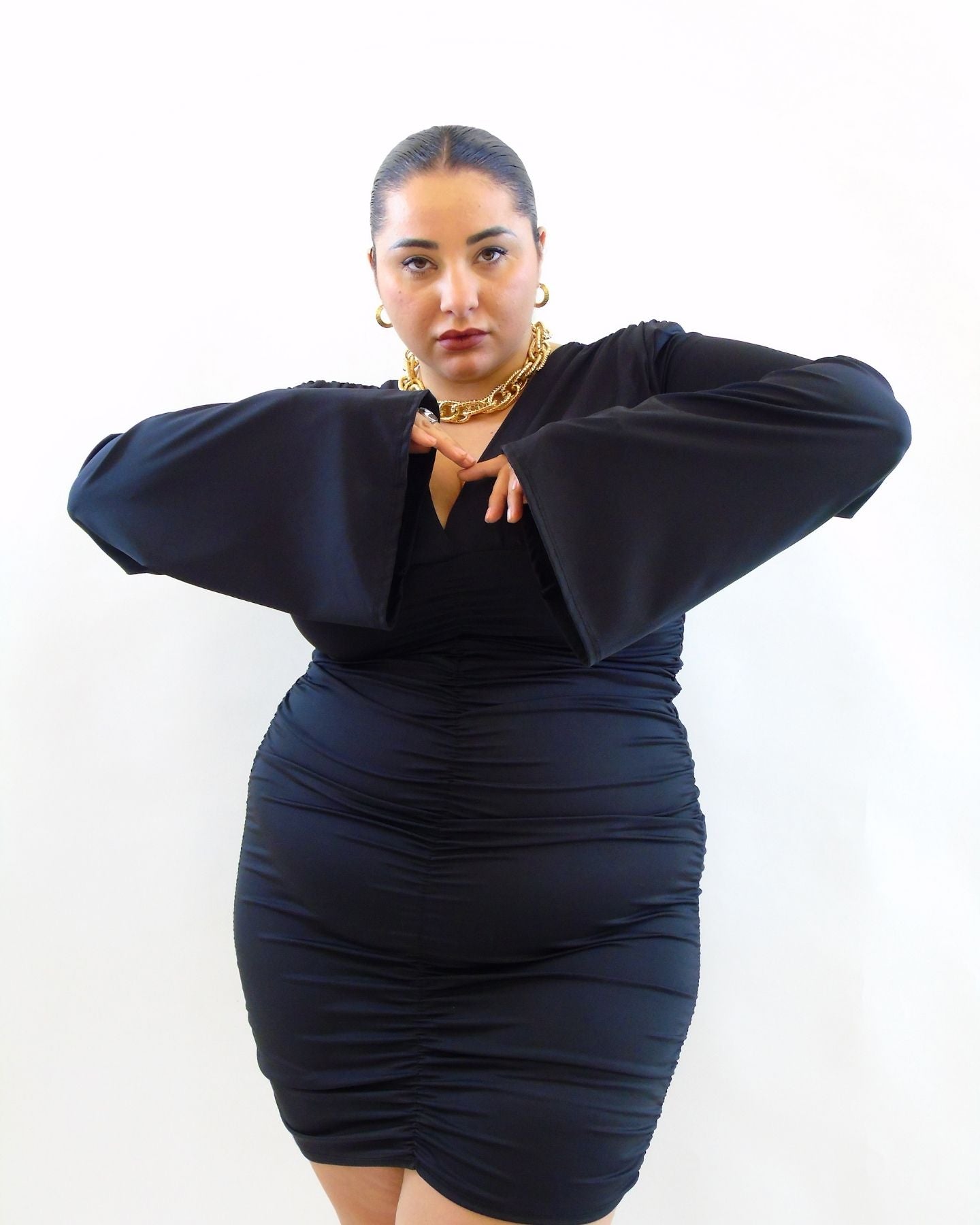 Abito con drappeggio