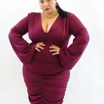 Abito con drappeggio