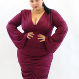 Abito con drappeggio