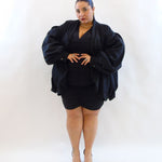 Abito con drappeggio