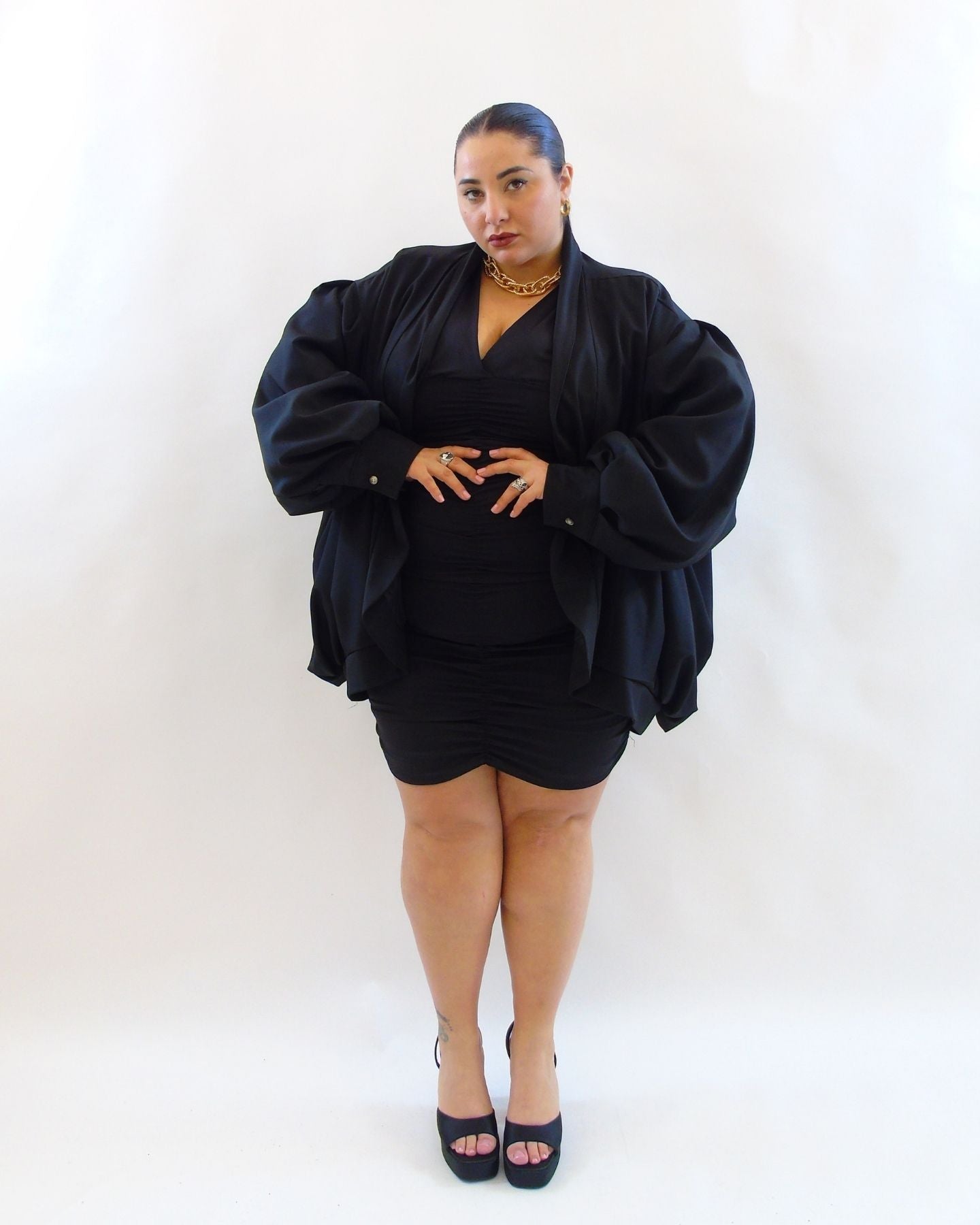 Abito con drappeggio