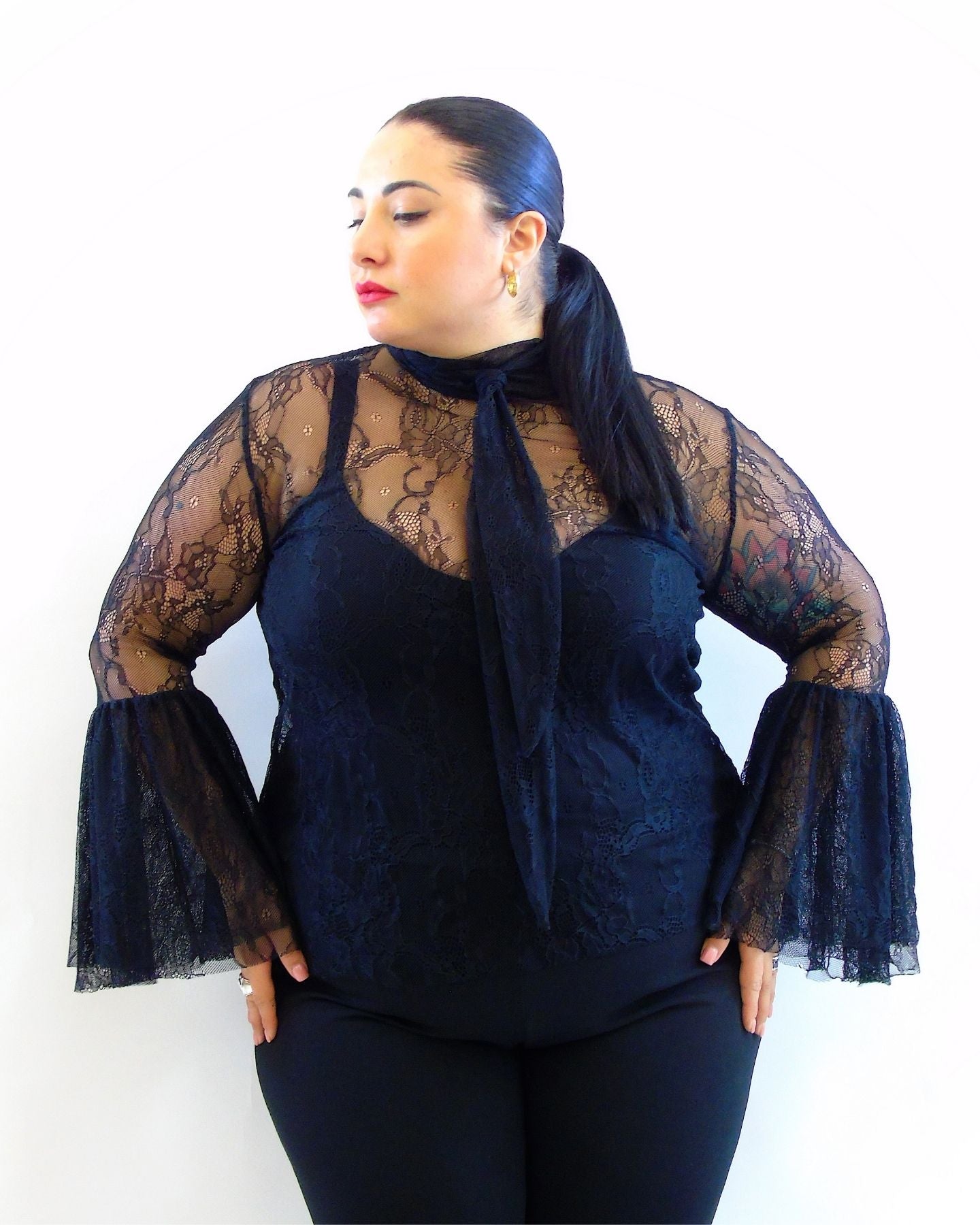 Maglia in pizzo con maniche ampie 251187