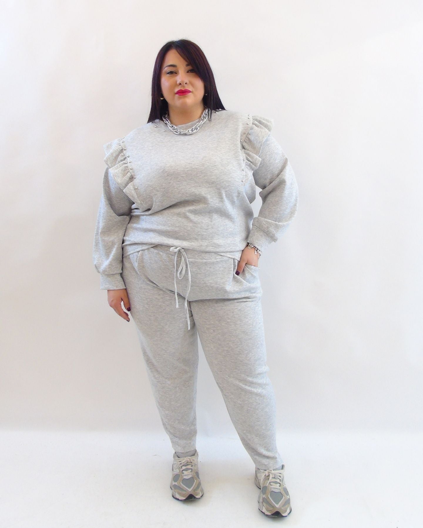 Pantalone con borchie 15767