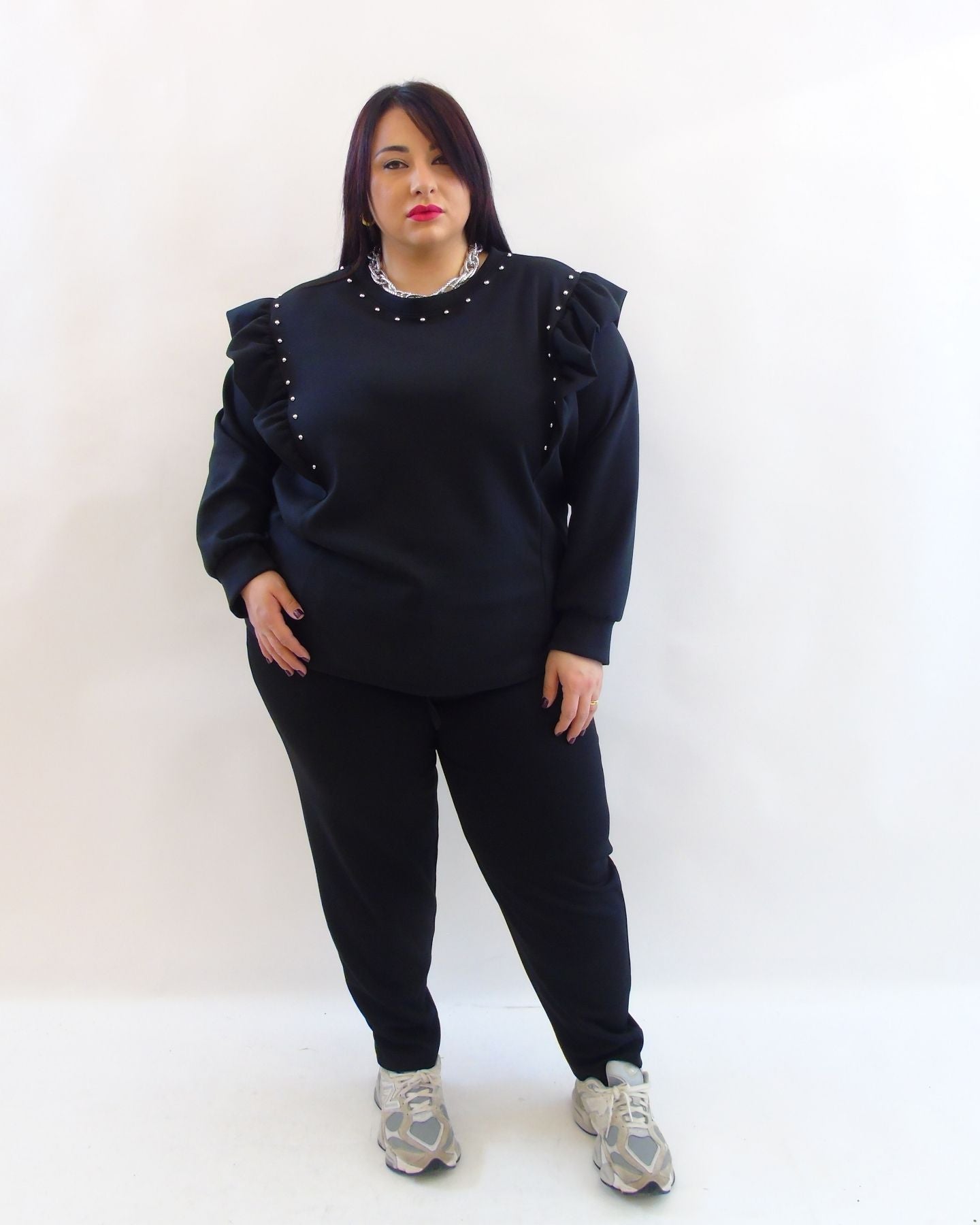 Pantalone con borchie 15767