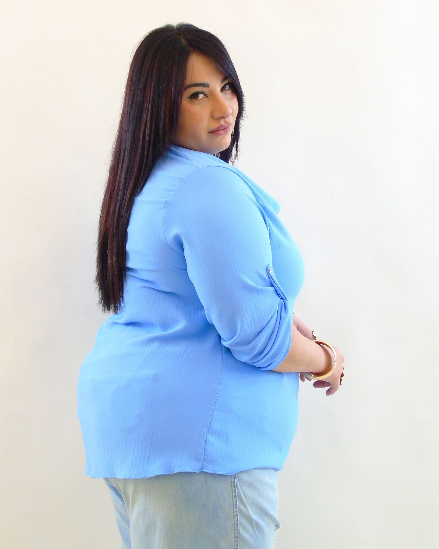 Blusa morbida con dettaglio in oro